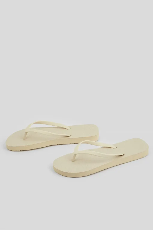 Klassische Beige Flip-Flops
