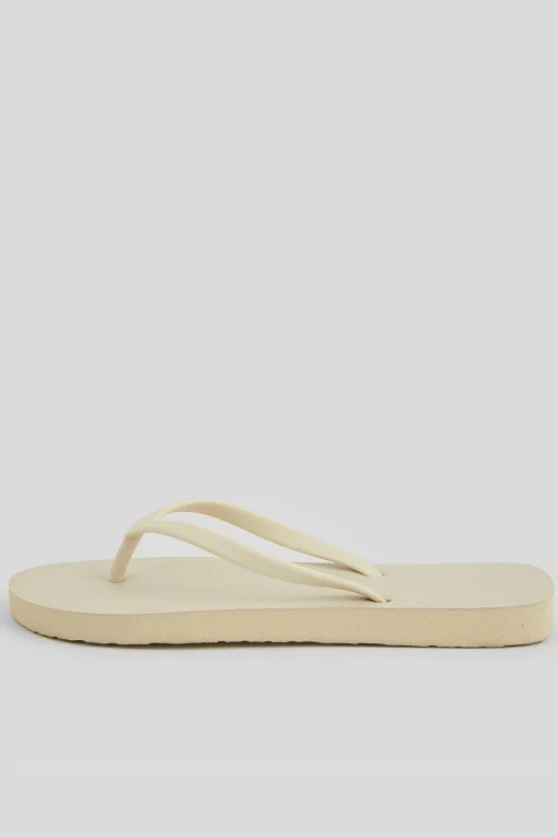Klassische Beige Flip-Flops